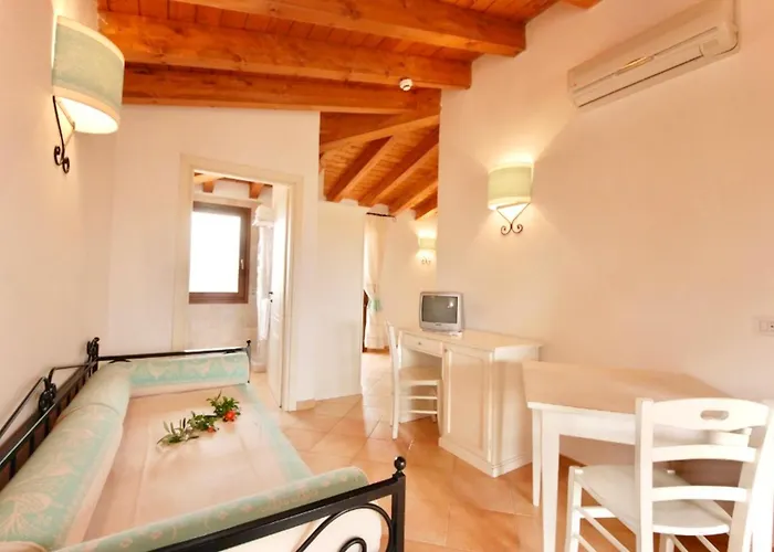 Apartahotel Isa-residence With Swimming-pool In Vignola Mare, With Air Conditioning And Private Outdoor Area