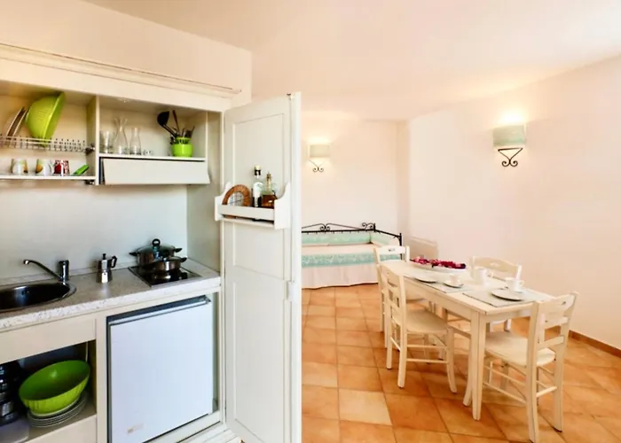 Apartahotel Isa-residence With Swimming-pool In Vignola Mare, With Air Conditioning And Private Outdoor Area 4*
